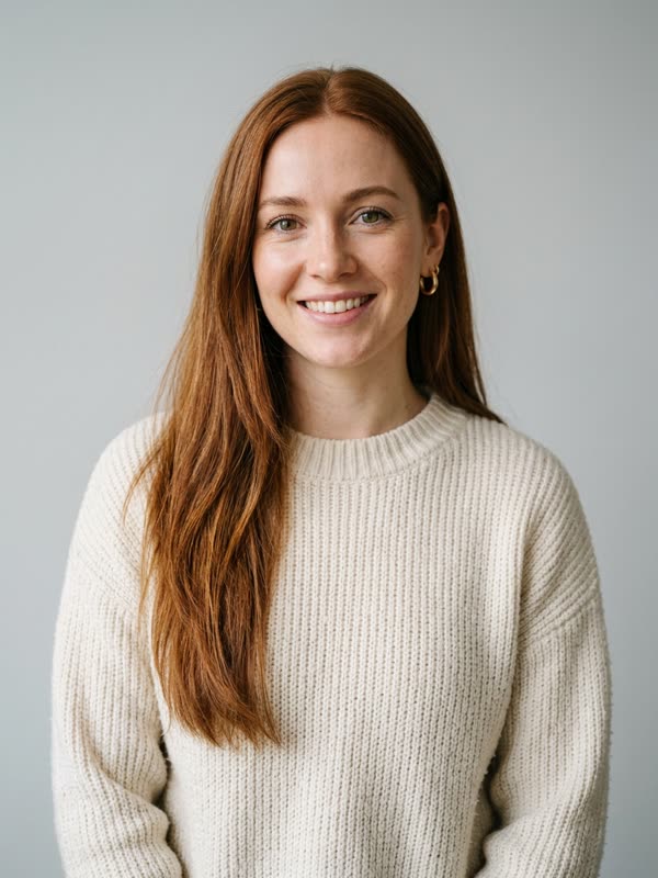 Before: fictional woman with long auburn hair in a cream sweater, the laptop partner